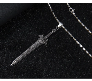Detailed close-up of retro silver sword pendant with intricate wing relief and box chain