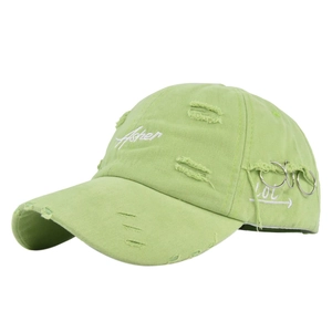 Detail of light green distressed baseball cap with Asher embroidery and three metal rings