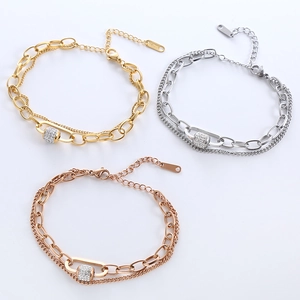 Double-layered stainless steel necklace with pavé zircon circle charms in gold and silver