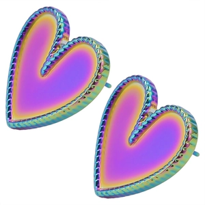 Macro detail of rainbow heart stud earrings with twisted rope texture and steel posts