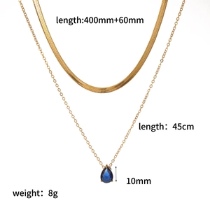 Detailed view of gold double-layer necklace with blue teardrop zircon and size labels