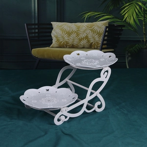 European style white 2-tier metal fruit tray with hollow floral patterns and butterfly stand