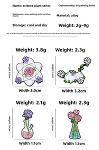 Detail view of four creative chemistry enamel pins featuring flask flowers and atoms