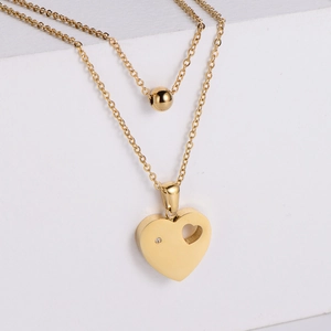 Minimalistische doppellagige Goldkette mit Kugel und hohlem Herz-Anhänger
