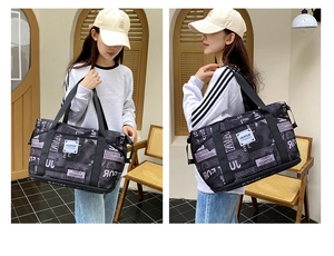 Detail showing newspaper print fitness bag with waterproof fabric and hand straps