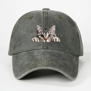 Detailed view of gray washed cotton baseball cap with a realistic peeking cat print