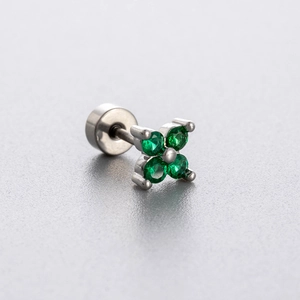 Silver stainless steel clover stud earring featuring four round cut green gemstones
