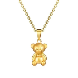 Golden stainless steel teddy bear pendant necklace with 3D texture on white background