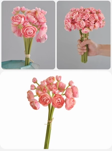 Detail of faux ranunculus wedding bouquet with pink gradient petals and green stems