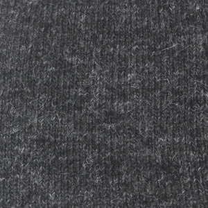 Macro detail of charcoal grey rabbit fur knit fabric with soft wool fiber texture