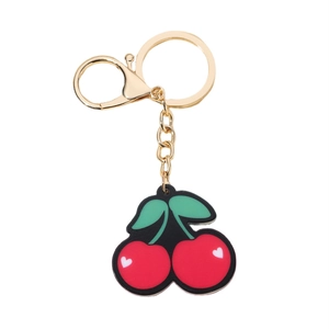 Cute cherry keychain with red fruit and green leaves on a gold ring for women's handbag