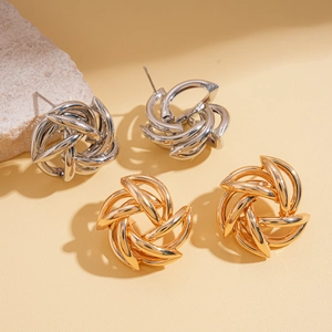 Modern geometric hollow flower swirl stud earrings in gold and silver metal finishes
