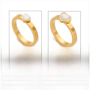 Detailed view of 6mm and 8mm heart-shaped tiger eye stones on gold stainless steel rings