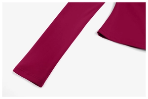 Close-up of wine red yoga top showing double-needle stitching and high-density knit fabric