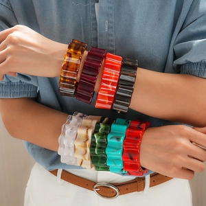 Bracciali rigidi in acrilico a onde con design a fiore dentato colorato