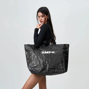 SMFK large foldable black gym bag with textured crinkle fabric and white logo lettering