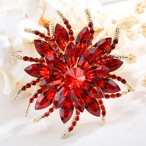 Elegant gold flower brooch with radiant red crystals and rhinestones for women