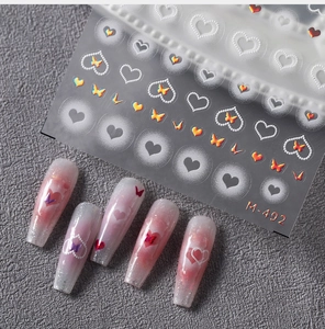 Detailed laser butterfly and matte heart nail art stickers on M-492 sheet for manicure