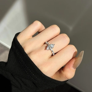 S925 sterling silver ring with marquise cut zircon and side accent diamonds on finger