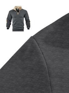 Detail view of men's quarter-zip hoodie with fleece collar and faux suede elbow patches