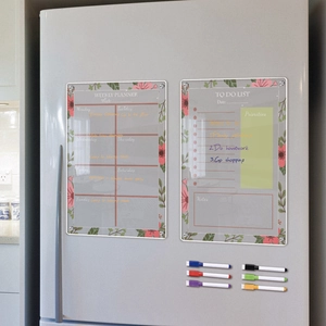Magnetic acrylic weekly planner and to-do list with floral border on refrigerator