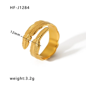 Detail of 18k gold plated feather ring showing 12mm width and 3.2g weight specs