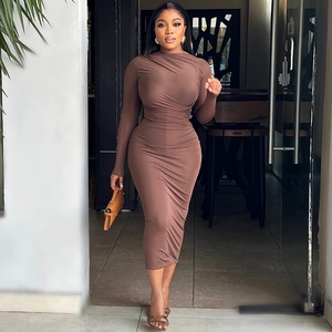 Detail showing the ruching design and high-stretch fabric of this brown bodycon dress