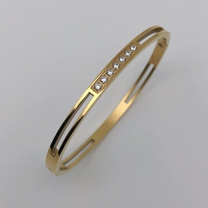 4mm gold titanium steel hollow cuff bracelet with row of sparkling white zircon stones