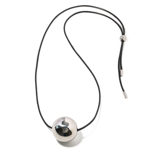 Polished silver sphere pendant on adjustable black cord necklace with minimalist metal ends