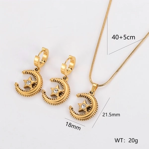 Gold star and moon jewelry set with sparkling crystals including necklace and earrings