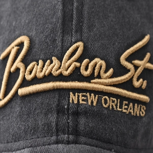Washed charcoal baseball cap with gold Bourbon St. New Orleans 3D embroidery
