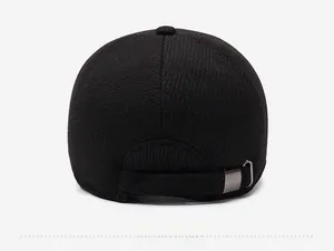 Detail of men's winter wool cap featuring a metal buckle and fine twill texture on the back