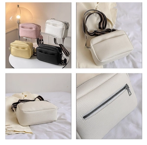 Detail view of lychee texture PU crossbody bag with a striped wide fabric shoulder strap
