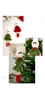 Detail of plush Christmas doll ornaments with velvet dresses and knit hats hanging on a tree