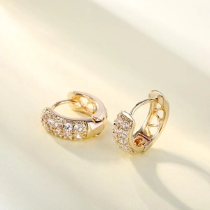 Elegant gold double row zircon huggie earrings with a sparkling crystal paved surface