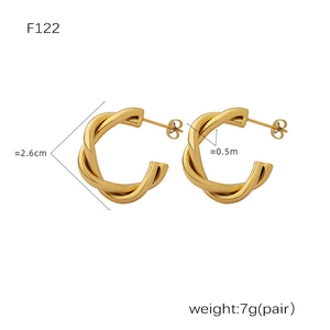 Detail view of gold-plated C-shaped twisted earrings with 2.6cm diameter and 7g weight