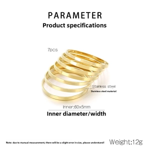 Macro detail of 7pcs gold stainless steel bangles set with 60mm diameter and 5mm width