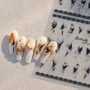 3D butterfly and lace nail art stickers set with elegant black patterns for manicures