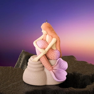 Detailed macro shot of a 3D mermaid candle featuring intricate scales and vibrant gradients