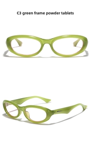 Close-up of Y2K green cat-eye sunglasses with pink lenses and silver leaf temple accents