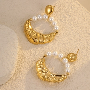 Golden horn-shaped stainless steel earrings with elegant white pearl drops for women