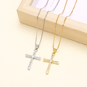 Classic cross pendant necklace in gold and silver finish with sparkling cubic zirconia stones