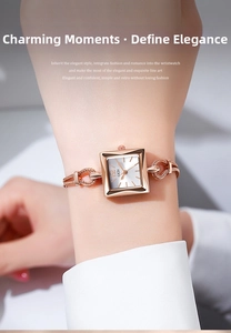 Macro detail of GEDI rose gold square watch featuring a white dial and woven metal strap