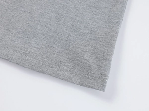 Close-up of double-needle hem stitching on gray modal slimming sports t-shirt