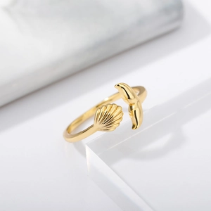 18k gold plated adjustable open ring featuring shell and whale tail ocean design