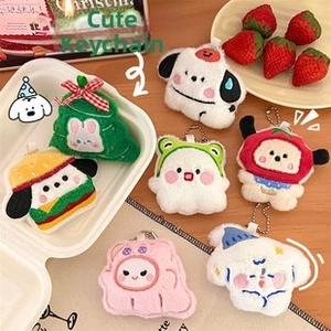 Close-up of cute cartoon plush charms with burger and tree elements on metal bead chains