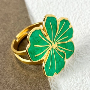 Vintage gold-plated stainless steel ring with green enamel floral four-leaf clover motif