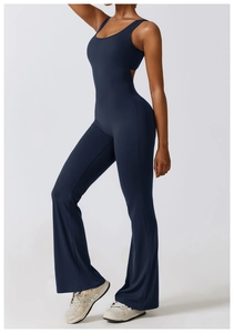 Detail of navy blue flare yoga bodysuit with side cutout and wide shoulder straps