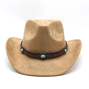 Close-up of suede cowboy hat with turquoise stone inlay and metal studs on leather band