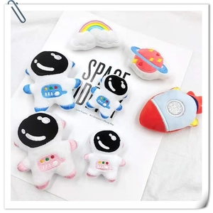 Space-themed plush astronaut and planet patches set for creative DIY decoration